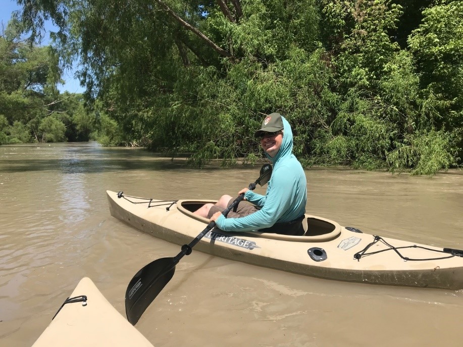 My youngest son Jared, who is a wildlife biologist studying mussels, kayaking on the San Antonio River near our home in Goliad. 