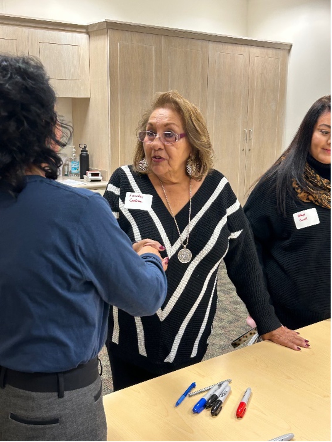 River Authority Board Member Lourdes Galvan meets with constituents during Westside Creeks Open House