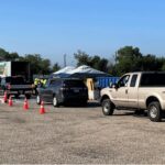 Cars line up in anticipation for a Household Hazardous Waste Collection Event.