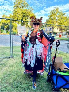 A woman dressed as a litter bug for River Warrior event