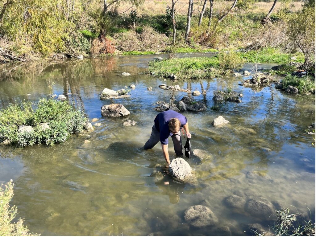 Scientist releases mussels into the San Antonio River