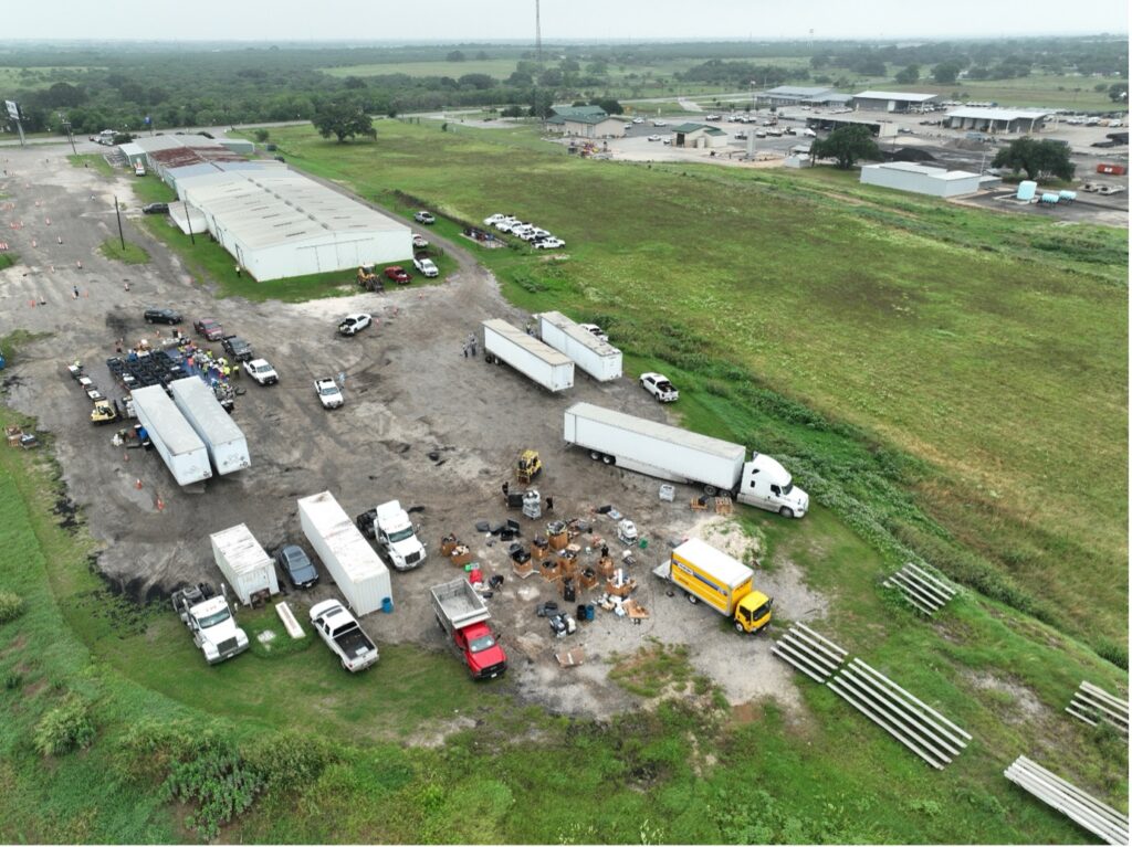 Aerial view of trucks collecting household hazardous waste