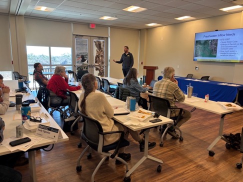 Classroom filled with adults during presentation